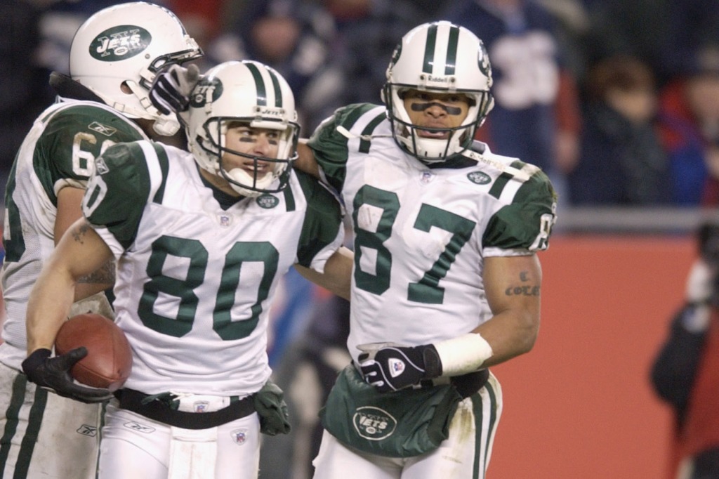 Wayne Cribbett and the LaVerano Coles celebrate during a Jets-Patriots game in 2002.