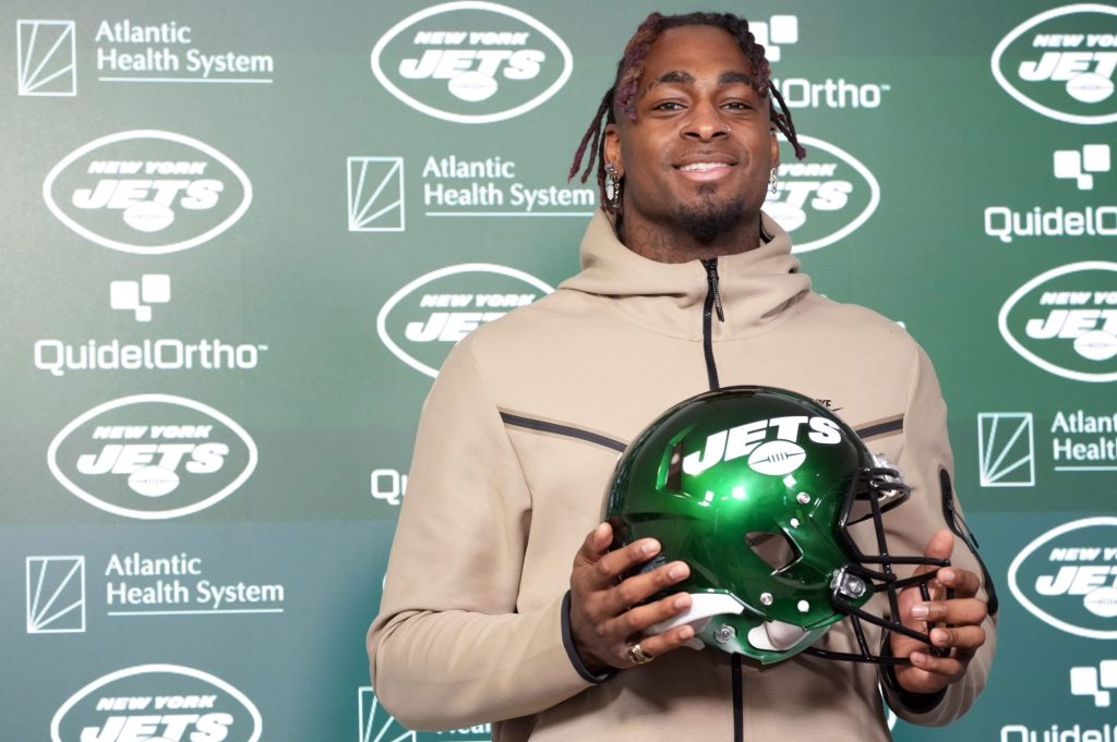 Will McDonald IV speaks to reporters during a news conference at the Jets' training facility