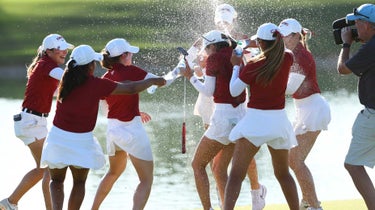 Stanford's Rose Zhang celebrates with her team after winning the individual medal after the final round of the Division I Women's Singles Stroke Golf Championship at Grayhawk Golf Club on May 22, 2023 in Scottsdale, Arizona.