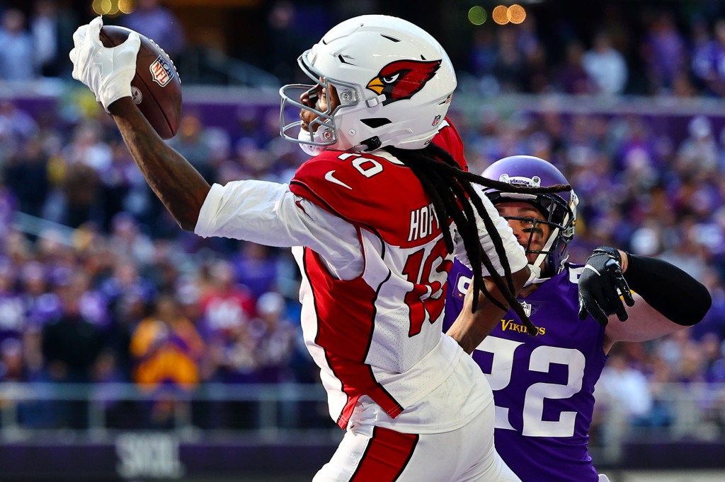 DeAndre Hopkins #10 of the Arizona Cardinals catches the ball for a touchdown as Harrison Smith #22 of the Minnesota Vikings defends during the second quarter at US Bank Stadium on October 30, 2022 in Minneapolis, Minnesota. 