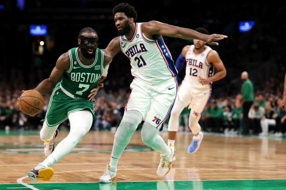 Philadelphia 76ers' Joel Embiid defends Boston Celtics winger Jalen Brown during the second half of Game 2 of the Eastern Conference Semifinals at TD Garden on Wednesday.  (Maddy Meyer/Getty Images)