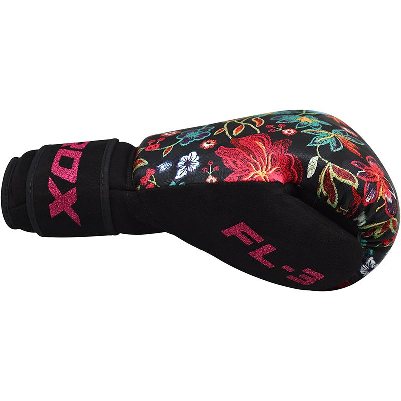 RDX premium ladies' boxing gloves are designed for serious female boxers. Crafted with top-quality materials, these gloves offer excellent protection, comfort, and durability. Perfect for sparring sessions and intense boxing workouts.