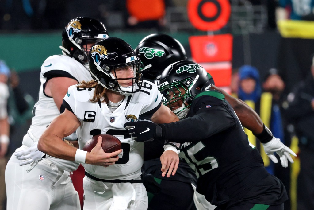 Quinnen Williams sacks Jaguars quarterback Trevor Lawrence forcing a fumble during the first quarter.
