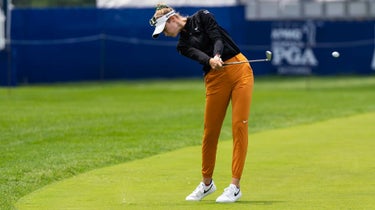 Nelly Korda hits an approach to the 18th green on the lower course of Paltusrol Golf Club during a practice round for the KPMG Women's PGA Championship on Tuesday, June 20th.