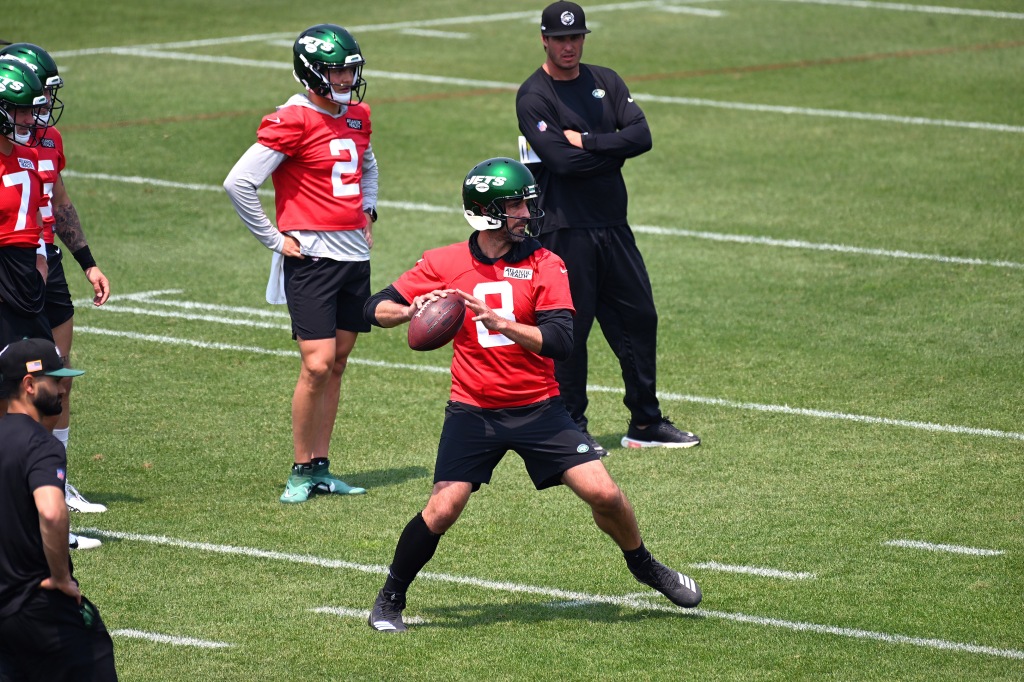 Jets quarterback Aaron Rodgers throws a pass during practice at the OTAs in Florham Park, NJ.