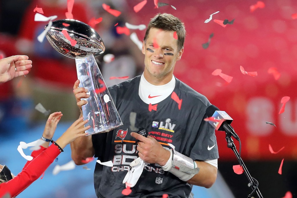 Super Bowl MVP Tom Brady (12) of the Buccaneers holds the Lombardi Trophy after the Super Bowl LV game between the Kansas City Chiefs and the Tampa Bay Buccaneers on February 7, 2021 at Raymond James Stadium, in Tampa, FL. 