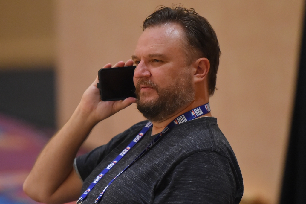 Daryl Morey, GM of the Houston Rockets, talks on the phone during practice as part of the NBA Restart 2020 on July 23, 2020 in Orlando, Florida.