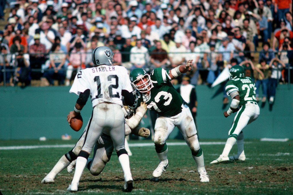 Joe Klecko (73) attempts to pressure the quarterback during the Jets' game against the Raiders in 1979.