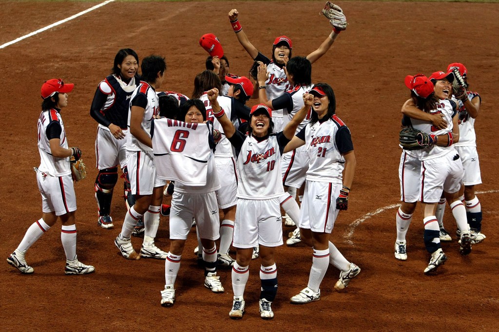 Japan celebrates their 3-1 win against the United States during the women's grand final gold medal softball game at the Fengtai Softball Field during Day 13 of the Beijing 2008 Olympic Games on August 21, 2008 in Beijing, China. 