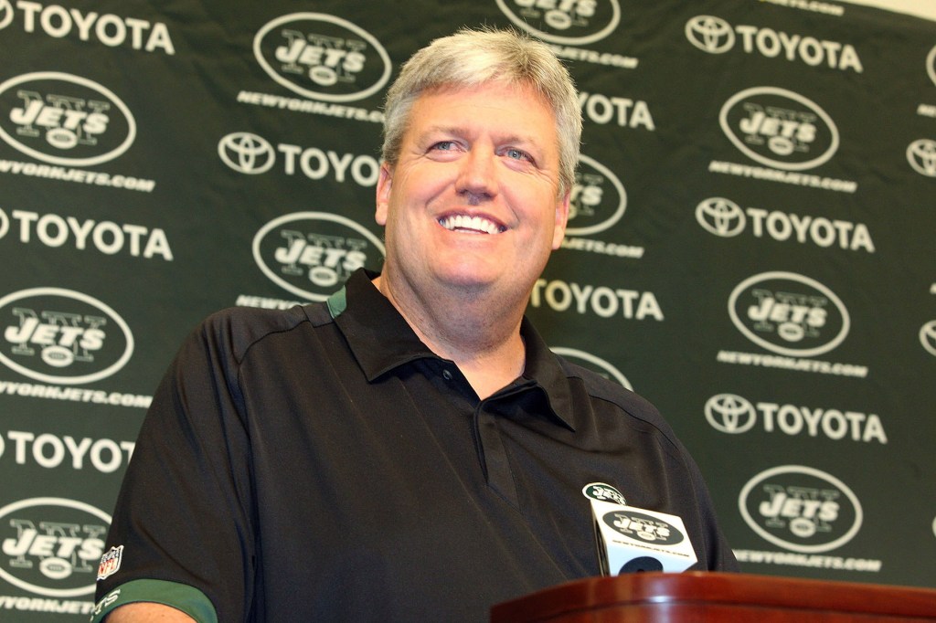 Head Coach Rex Ryan of the New York Jets smiles as he addresses the media at the announcement that the New York Jets will be the featured team on the HBO Show, "Hard Knocks: Training Camp With The New York Jets" on March 25, 2010 in Florham Park, New Jersey. The Five-part sports-based reality series will begin airing on August 11, 2010. 