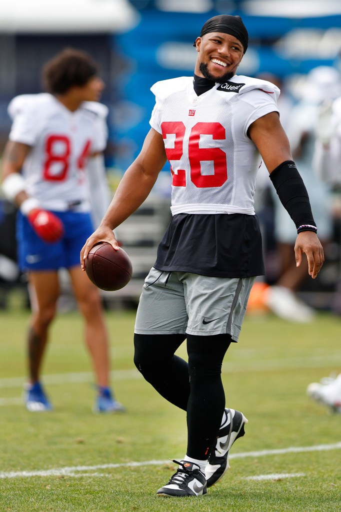 Saquon Barkley ended a potential holdout by signing a one-year deal with the Giants.