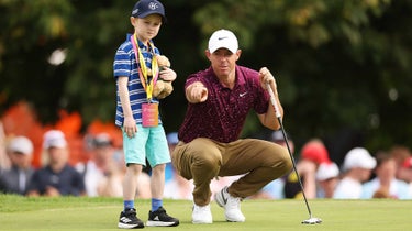 Rory mcilroy and a young fan at the 2023 irish open.