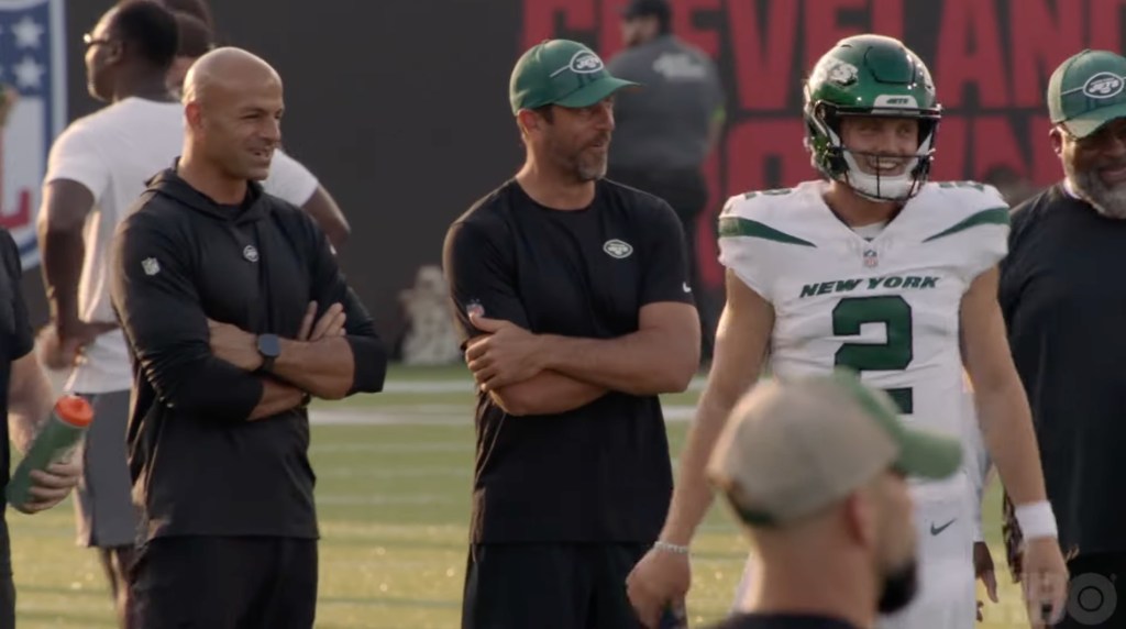Robert Saleh, Aaron Rodgers and Zach Wilson are seen during an episode of "Hard Knocks"
