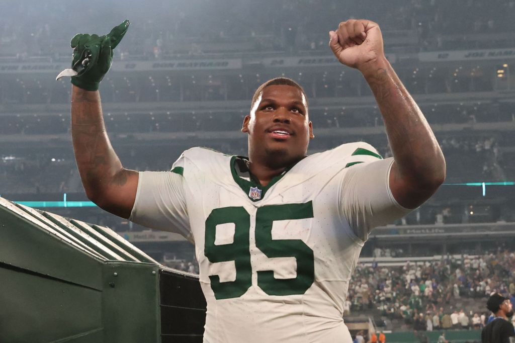 Quinnen Williams celebrates after the Jets' overtime win over the Bills.
