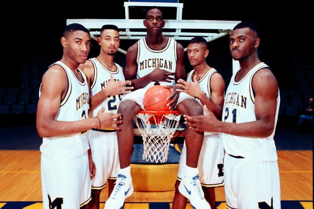 FILE - In this November 1991, file photo, Michigan's Fab Five from left, Jimmy King, Juwan Howard, Chris Webber, Jalen Rose and Ray Jackson pose in Ann Arbor, Mich. Michigan coach Juwan Howard was honored as The Associated Press men's basketball coach of the year Thursday, April 1, 2021. (AP Photo/File)User Upload Caption: Michigan Fab 5