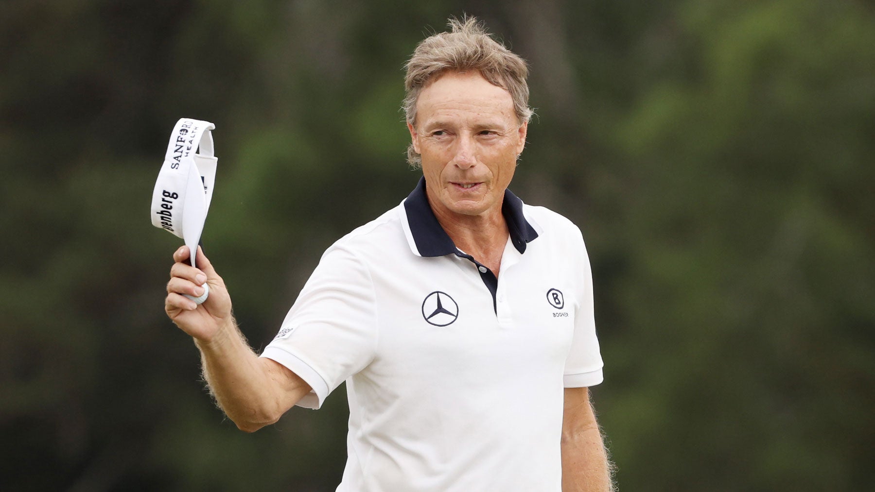 bernhard langer tipping his cap at the 2023 masters