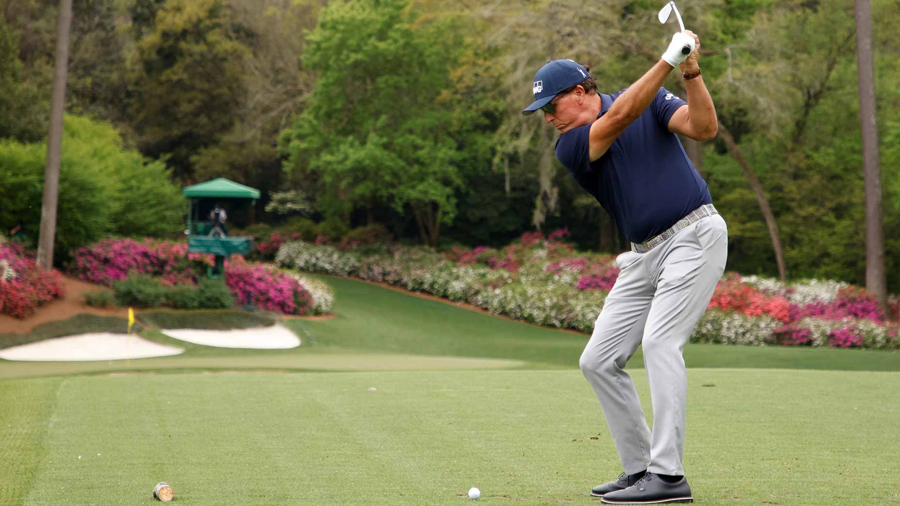 Phil Mickelson hits a shot at the 12 hole of Augusta National.